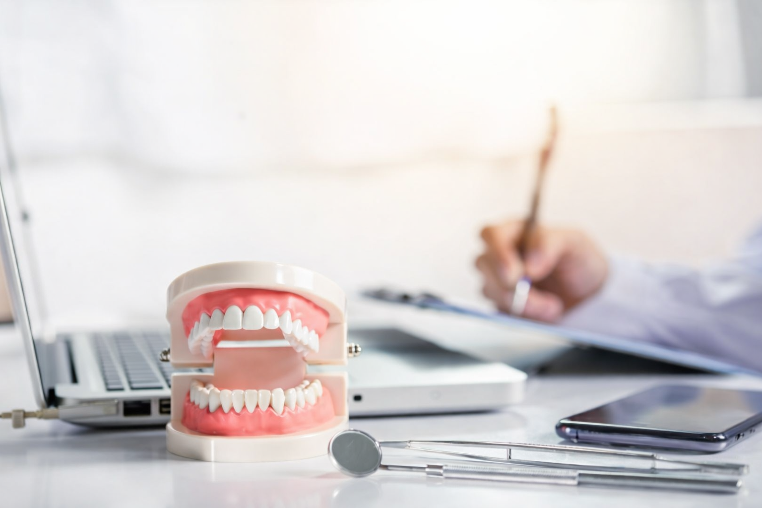 Dental practice compliance documentation with dental model and instruments